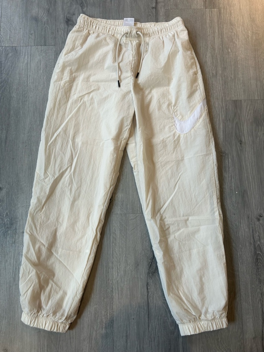 Nike teens Cream Jogger Pants with White Swoosh